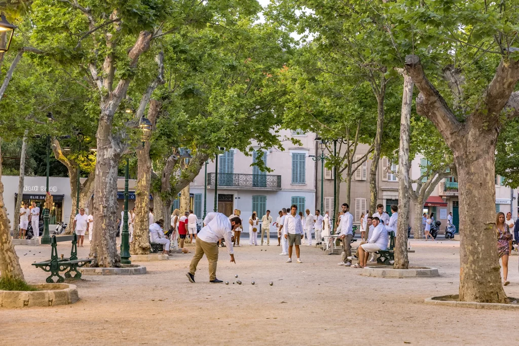 Playing boule at Place des lices